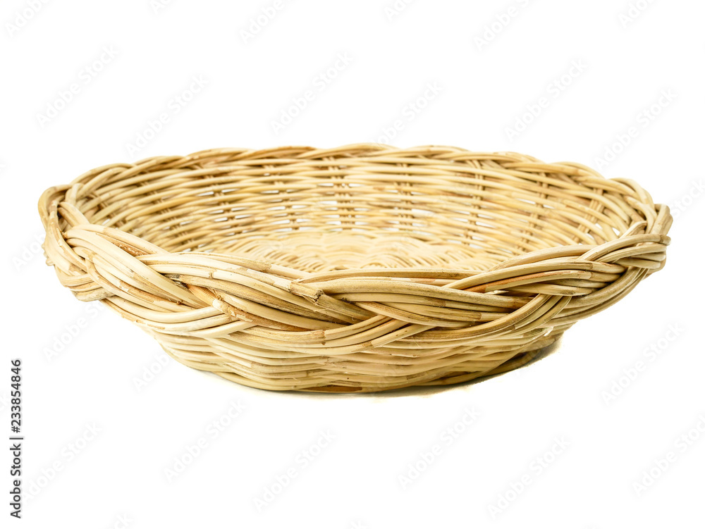 Obraz premium Empty wicker basket isolated on white background.