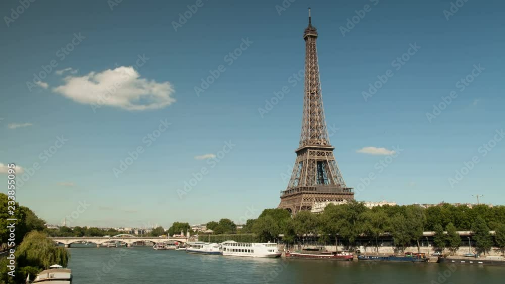 Timelapse of the Eiffel tower and the Seine with boats Timelapse of the Eiffel tower and the Seine with boats