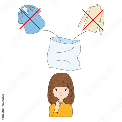 いらない衣類を捨てるか考えている女性