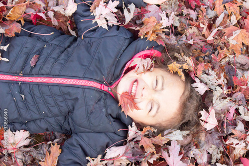 girl with autumn leaves