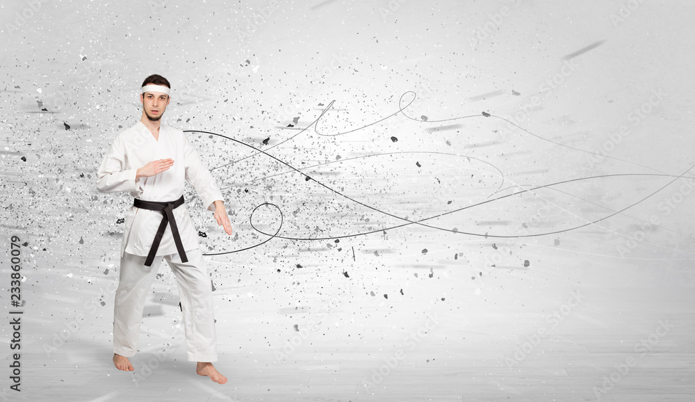 Young karate trainer doing karate tricks with chaotic concept
Young karate trainer doing karate tricks with chaotic concept