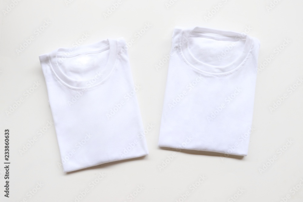 black , gray , white t-shirts with wood box and cactus. rustic background black , gray , white t-shirts with wood box and cactus. rustic background