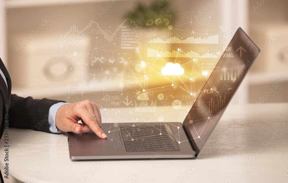 Business woman in homey environment using laptop with cloud technology concept
Business woman in homey environment using laptop with cloud technology concept