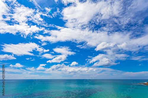.white cloud  in blue sky above the ocean.. © Narong Niemhom