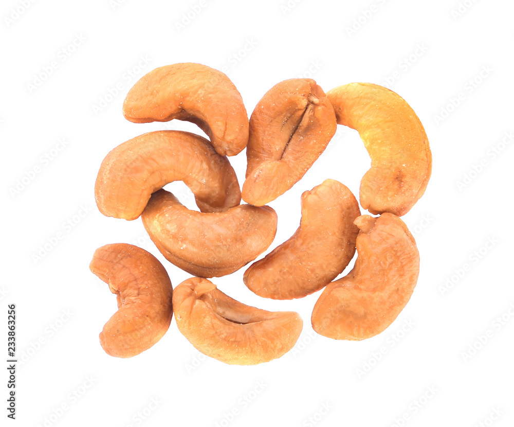 Roasted cashews isolated on a white background Roasted cashews isolated on a white background