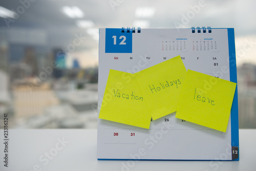 Fotótapéta Vacation, holiday and leave on paper note stick on the calendar of December for
