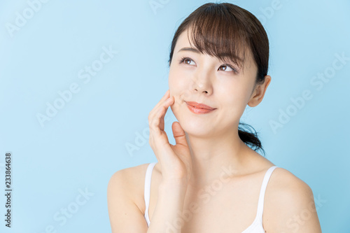 attractive asian woman beauty image on blue background