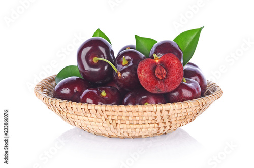 red cherry in basket isolated on white background