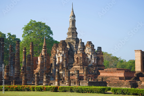The ruins of the Buddhist temple Wat Mahathat close up on a sunny morning. Sukhothai, Thailand © sikaraha