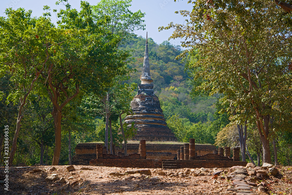 Chedi of the ancient Buddhist temple Wat Chedi Ngarm on a sunny day. Thailand, Sukhothai
