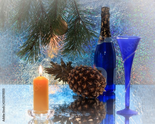 Christmas still life with candle and decorations photo