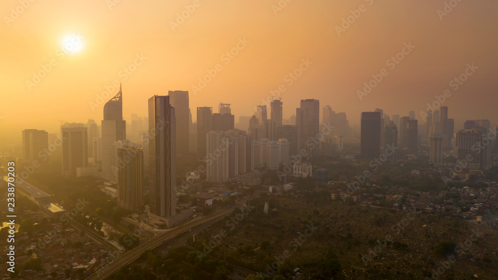 Jakarta city with skyscrapers at sunset