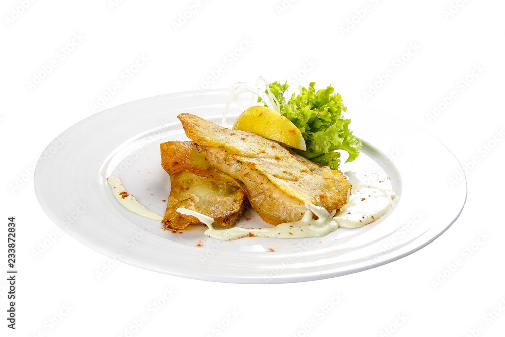Cod fillets with lemon and salad