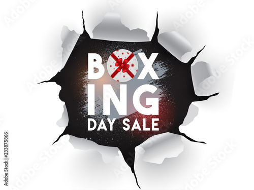 Torn paper style poster or flyer design for Boxing Day Sale concept.