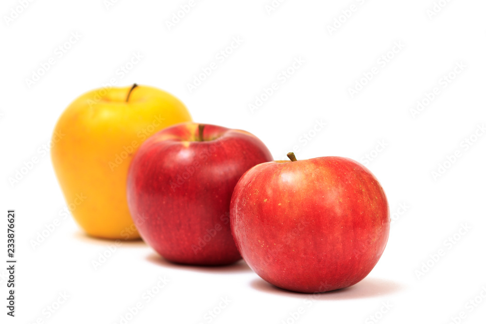 Row of ripe apples on a white background Row of ripe apples on a white background