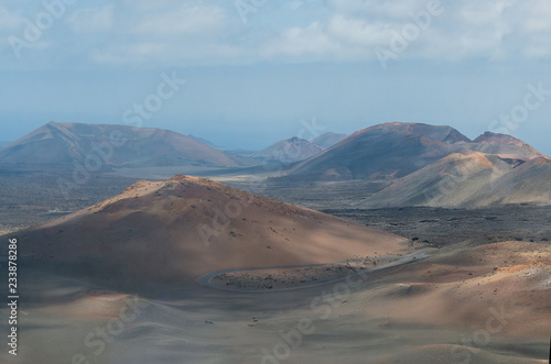.Valle del Silencio, Valley of Silence in Timanfaya National Park in Lanzarote,Canary Islands,Spain. The spectacular volcanic landscape background..
