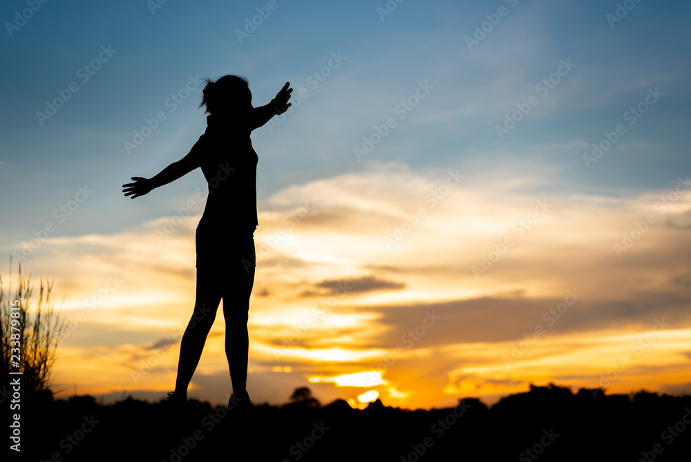 Fototapeta premium young woman warming up outdoors at park