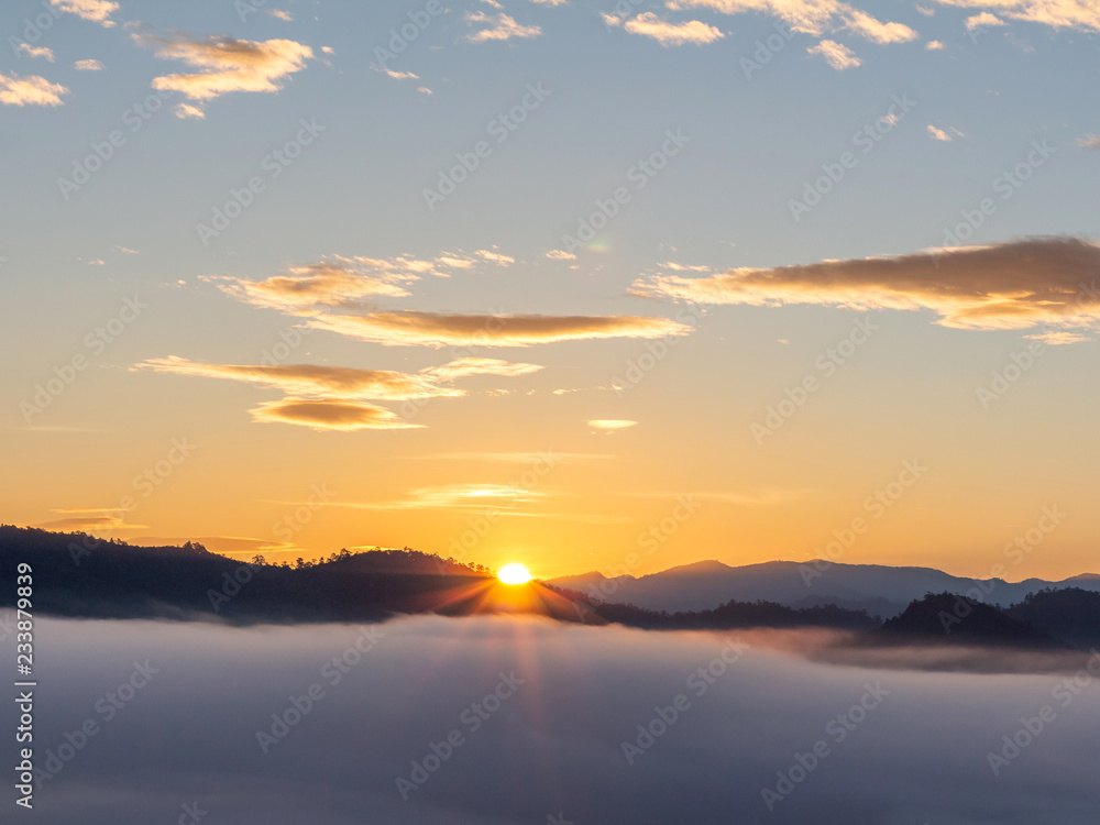 Sunrise with early morning sky scene covered in foggy Sunrise with early morning sky scene covered in foggy