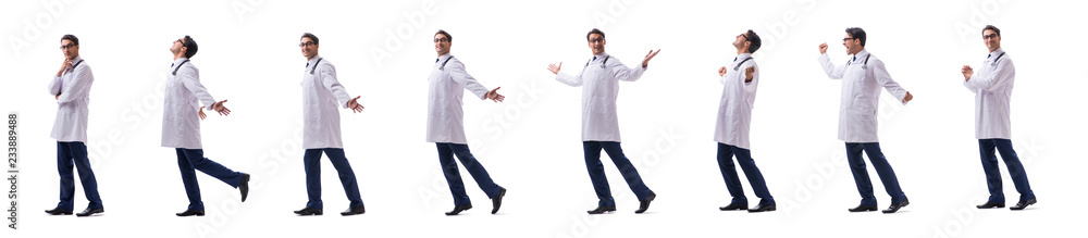 Young doctor physician standing walking isolated on white backgr Young doctor physician standing walking isolated on white backgr