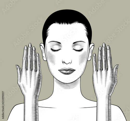 Head of a meditating woman with closed eyes and raised hands