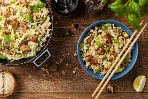 Fried veal, with rice, Chinese cabbage and mushrooms. Sprinkled with sesame and soy sauce.