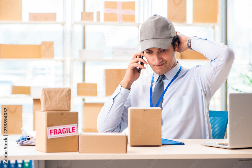 Male employee working in box delivery relocation service Male employee working in box delivery relocation service