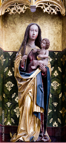 Bardejov, Slovakia. 2018/8/9. A statue of the Virgin Mary cradling Baby Jesus in the Basilica of St Giles (Aegidius, Gilles) in Bardejov. photo