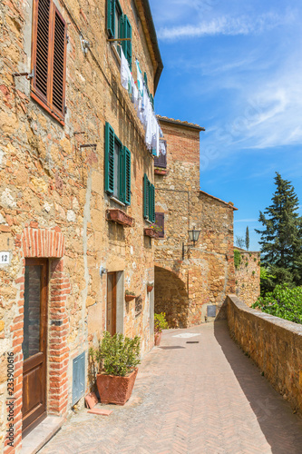 Walkway on a terrace at a residential building with laundry out to dry