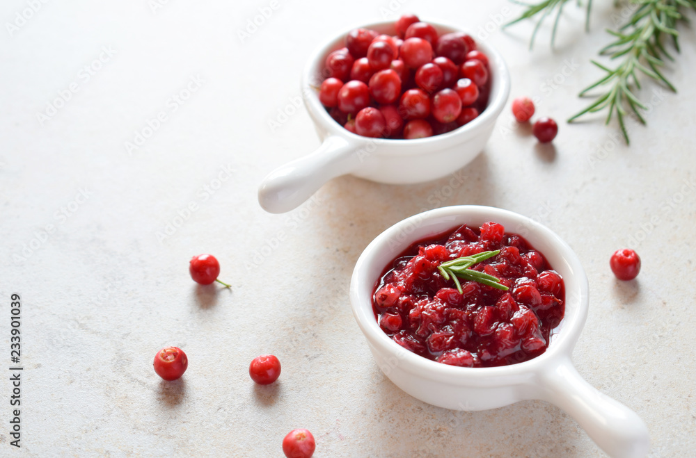 Cowberry sauce with rosemary and coconut sugar. Cranberry confiture. Spicy berry jam to meat, turkey. Autoimmune Paleo. Diet healthy food concept. Cereals Gluten Dairy free. Copy space. Cowberry sauce with rosemary and coconut sugar. Cranberry confiture. Spicy berry jam to meat, turkey. Autoimmune Paleo. Diet healthy food concept. Cereals Gluten Dairy free. Copy space.