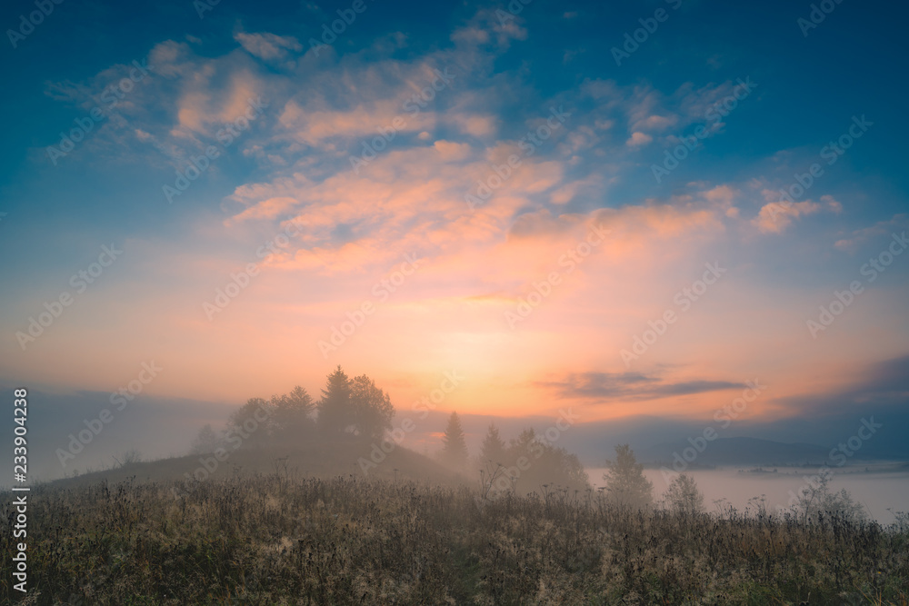 Sunrise in ukrainian carpathian mountain valley