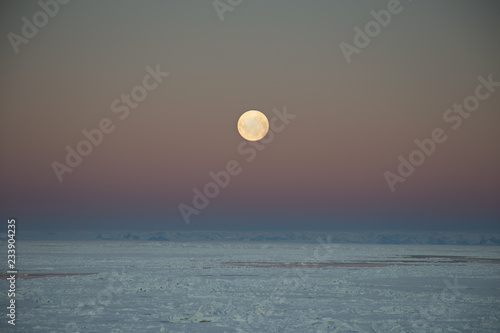Moon rise over the sea ice of the Antarctic