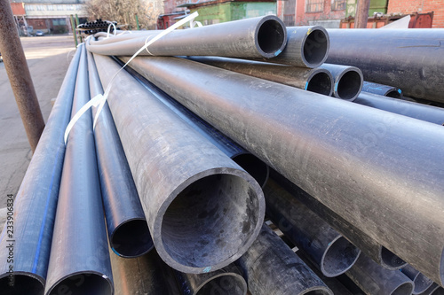 Old plastic pipes of various sizes and diameters