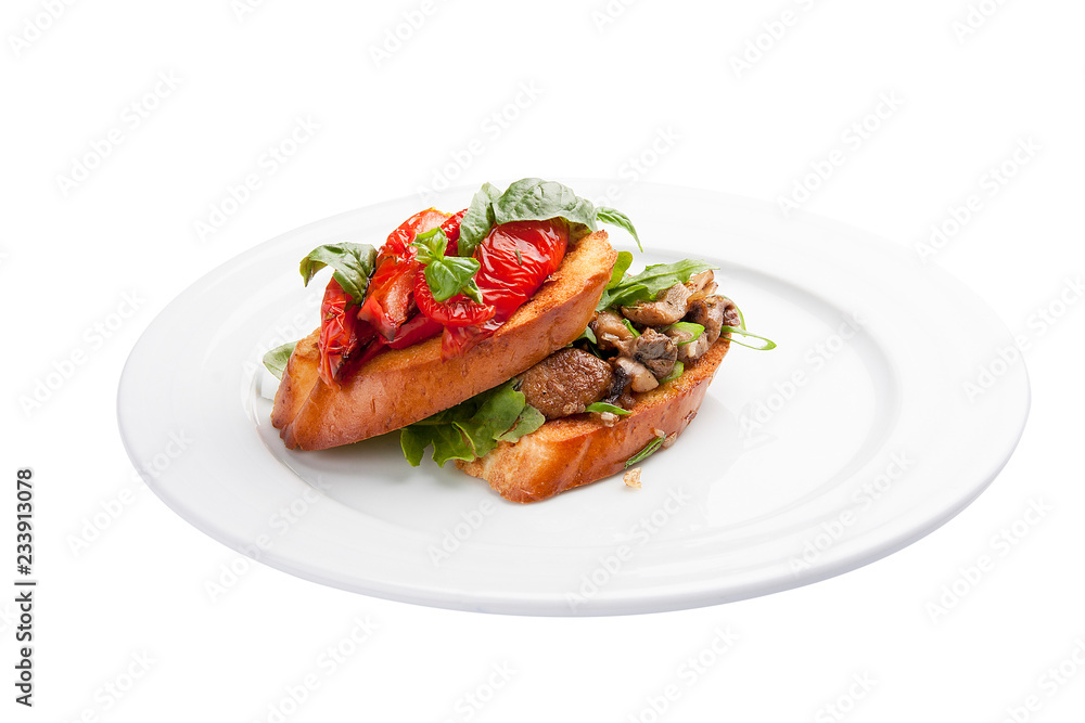 Bruschetta with tomatoes and mushrooms. On a white background Bruschetta with tomatoes and mushrooms. On a white background