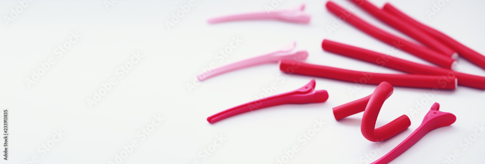 Female colored curlers and hair pins Female colored curlers and hair pins