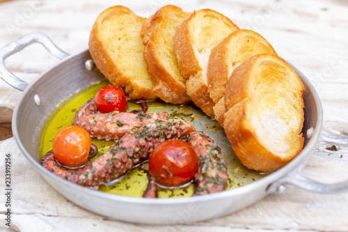 delicious octopus grilled with toasts