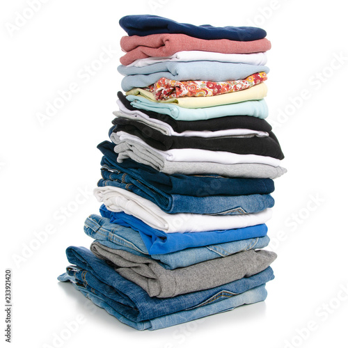 A stack of clothes jeans t-shirt shirt on a white background. Isolation
