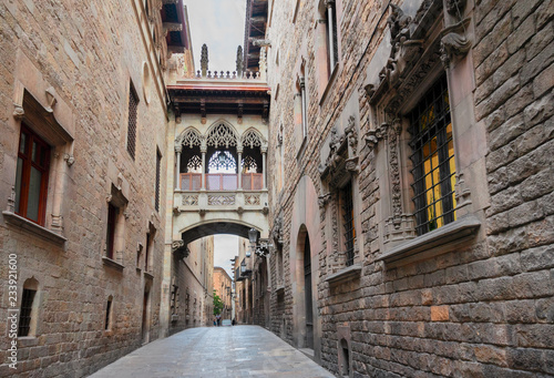 Famous mediveal Bridge between buildings and street in Barrio Gotic quarter of Barcelona, Spain
