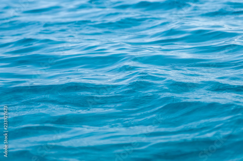 Background of blue calm sea waves © Сергей Илюхин
