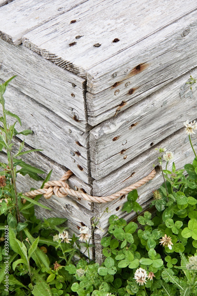 Old wooden box with rope Old wooden box with rope