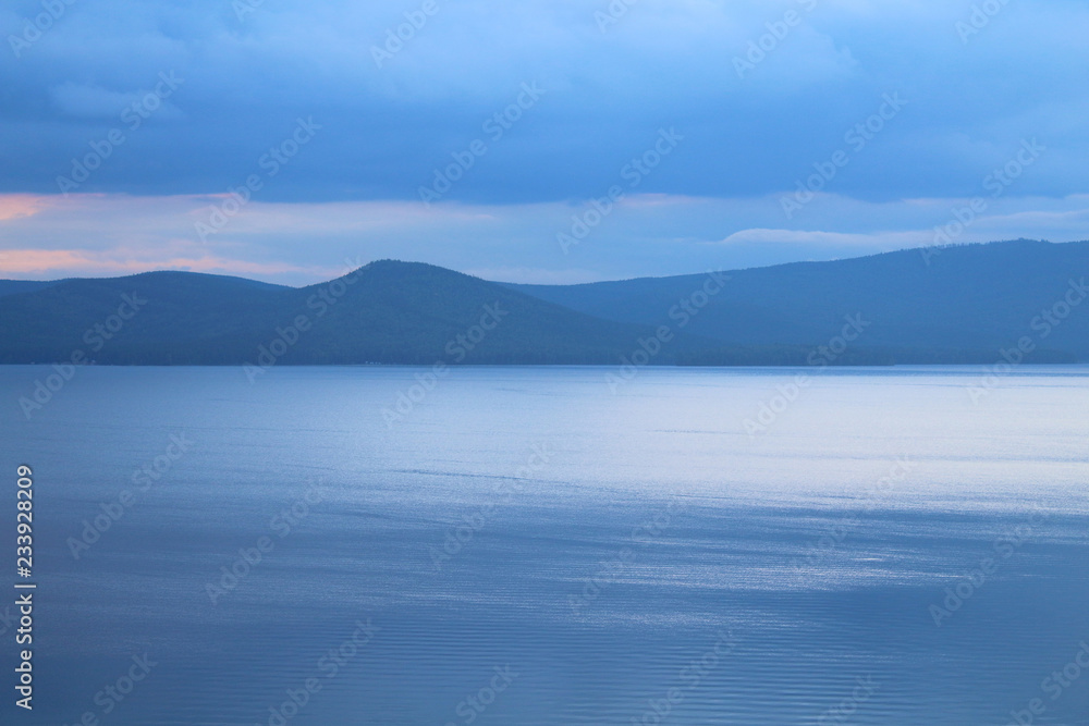 Wonderful view of the lake and the mountains. Background. Landscape.