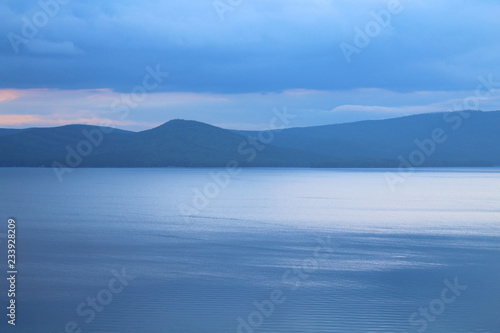 Wonderful view of the lake and the mountains. Background. Landscape.