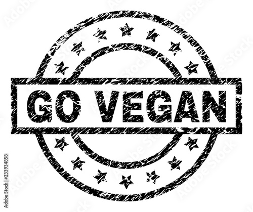 GO VEGAN stamp seal watermark with distress style. Designed with rectangle, circles and stars. Black vector rubber print of GO VEGAN title with corroded texture.