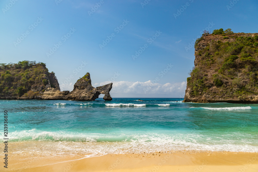 Beautiful tropical beach Atuh at Nusa Penida island. Famous tourists point near Bali island, Indonesia