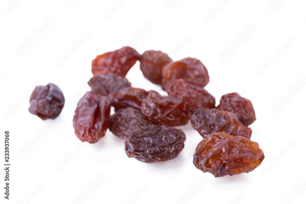 Black raisins dried sweet grapes isolated on white background