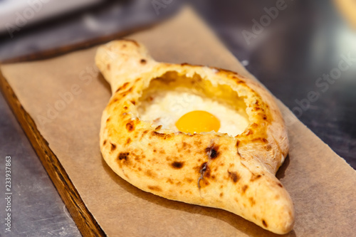 Traditional Georgian dish - khachapuri, bread with egg photo