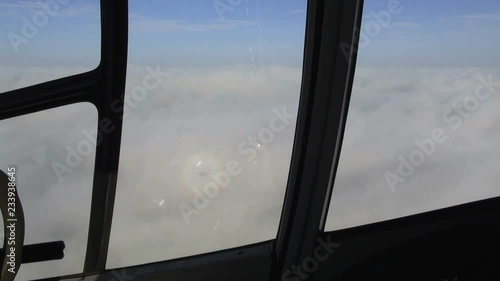 Wallpaper Mural flying in a helicopter above sea, reflection, shadow Torontodigital.ca