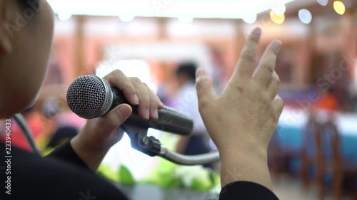 Seminar Conference Concept: Smart Asian business people speech, speaking with microphones keynote in meeting room, talking gesturing protesting or belief for explaining in convention background