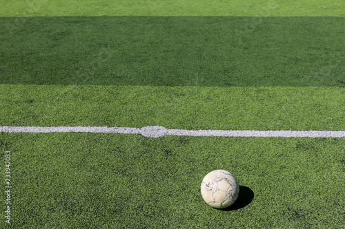 Football on artificial turf. It is for green background in a stadium