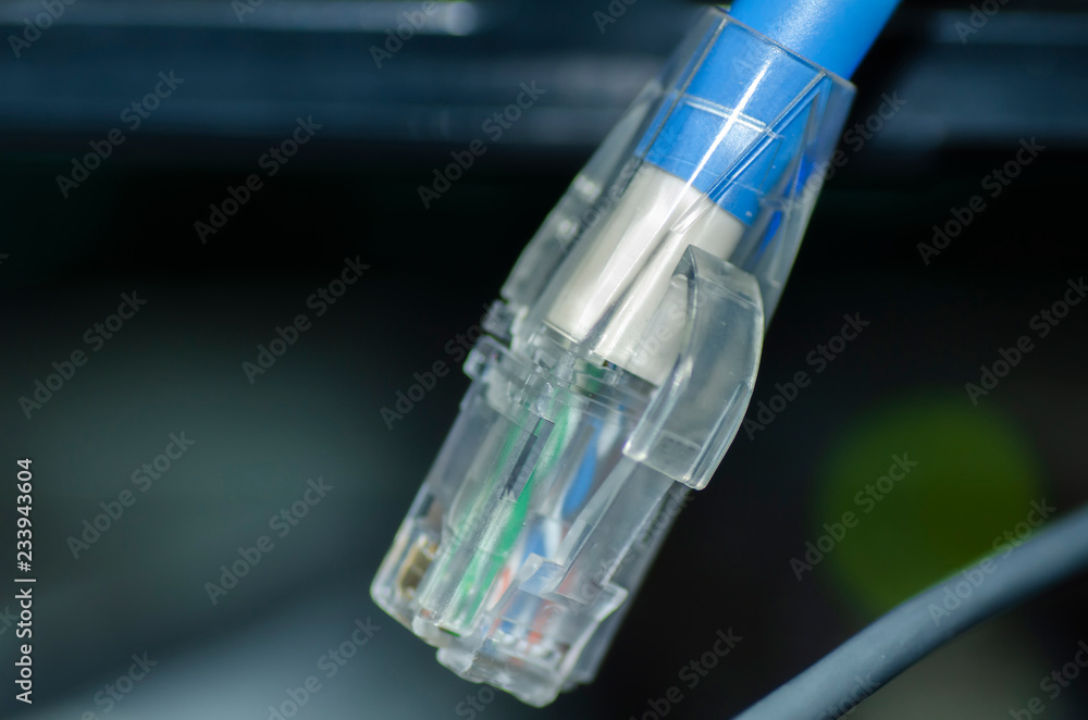 close-up image of Ethernet cord RJ45 for network and internet connection.selective focus shot close-up image of Ethernet cord RJ45 for network and internet connection.selective focus shot