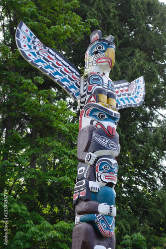 Beautiful Totem Poles among the trees in Stanley Park, Vancouver, British Columbia